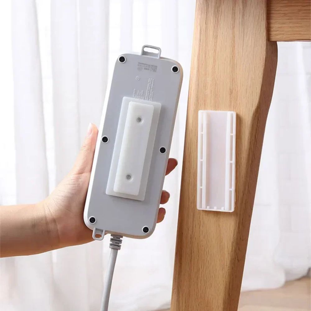 Keep your workspace neat and cable-free with this clever removable power strip mount.