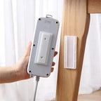 Keep your workspace neat and cable-free with this clever removable power strip mount.