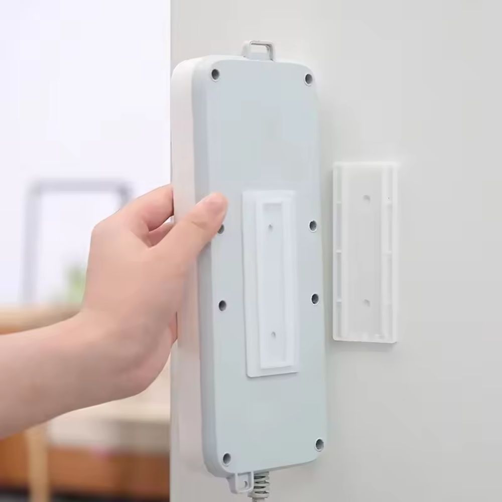 Keep your workspace neat and cable-free with this clever removable power strip mount.